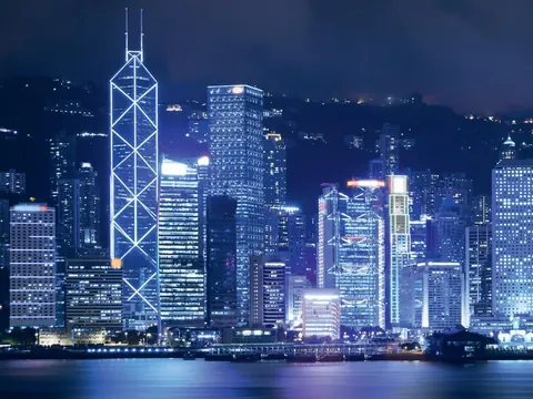 A financial district skyline at night